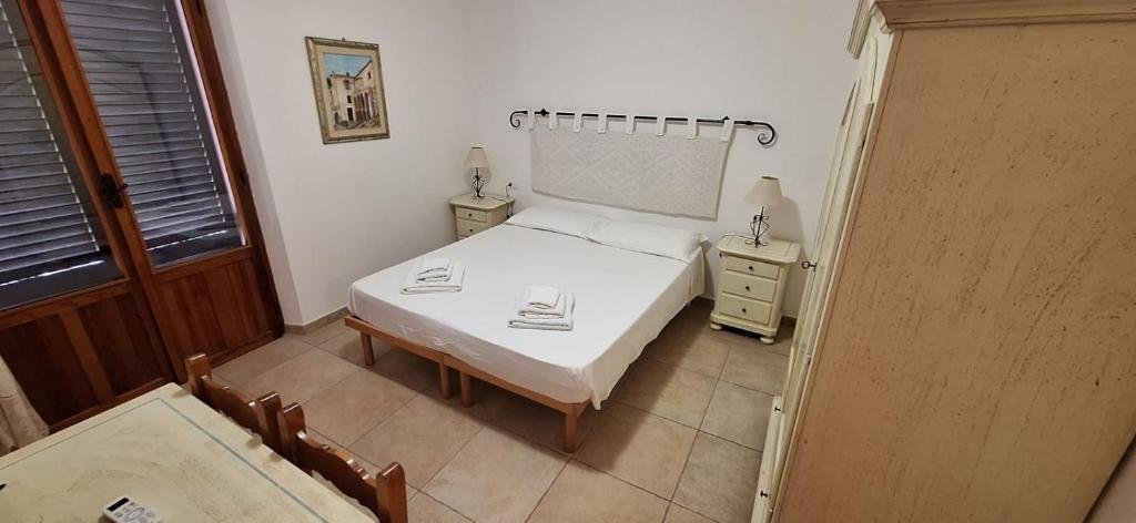 Postel nebo postele na pokoji v ubytování Nurache