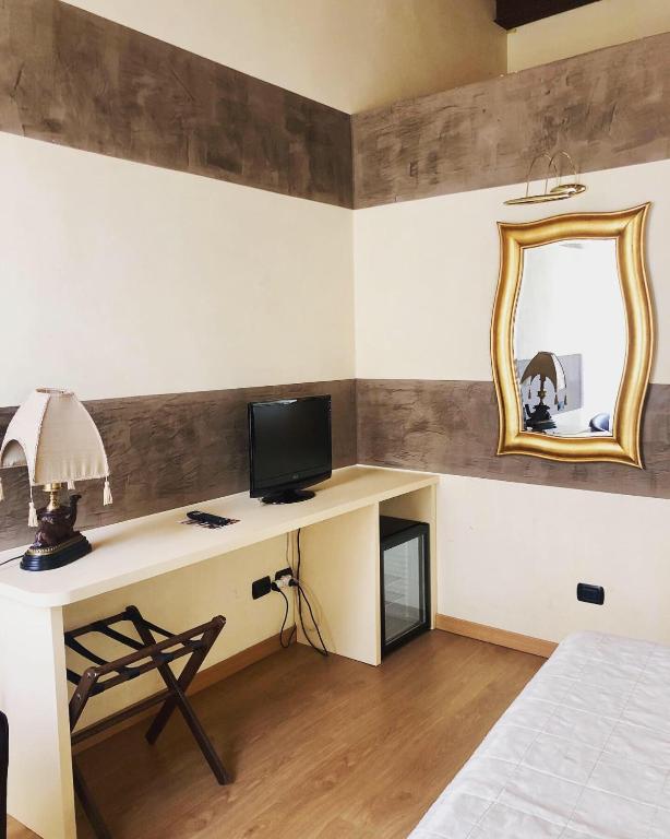 TV a/nebo společenská místnost v ubytování Boutique Hotel Scalzi - Adults Only