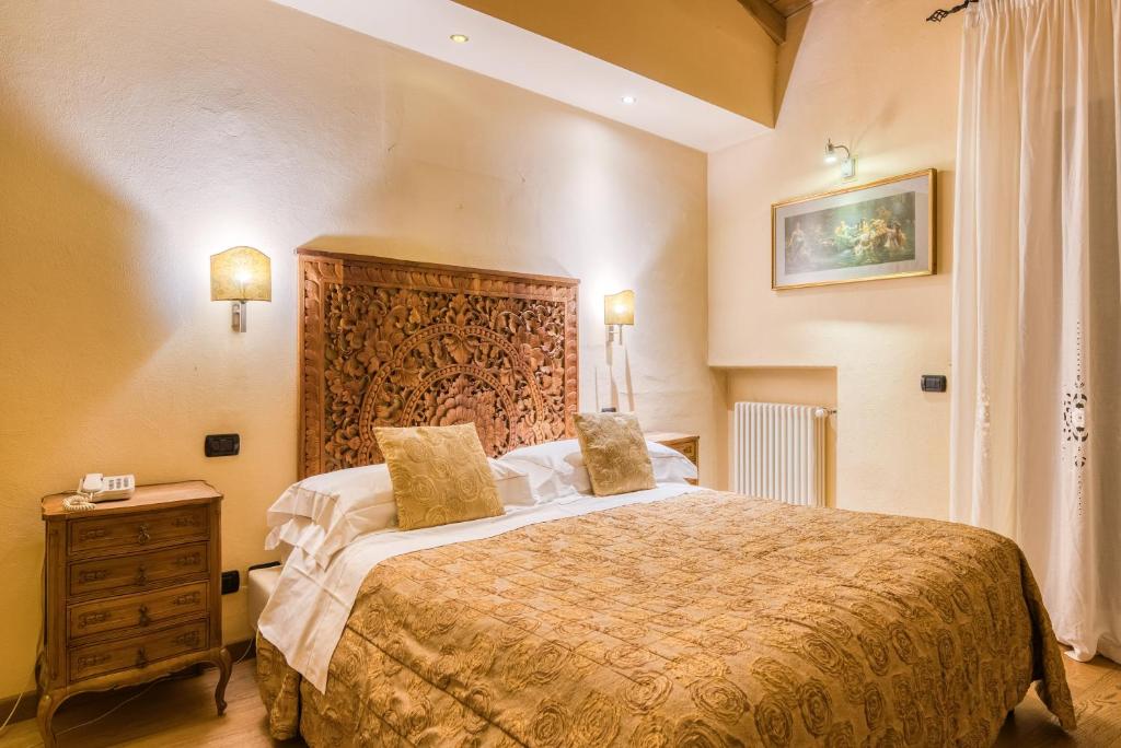 Postel nebo postele na pokoji v ubytování Boutique Hotel Scalzi - Adults Only