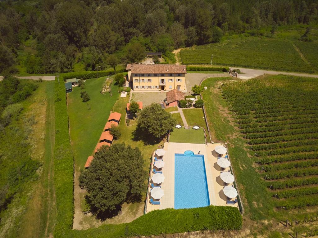 an aerial view of a estate with a swimming pool at Vigna Dell'Acqua in Santo Stefano Belbo