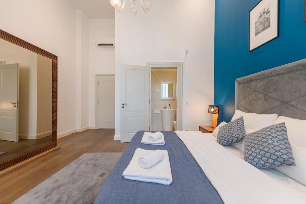 Posteľ alebo postele v izbe v ubytovaní ZOYA LUXURY RESIDENCE
