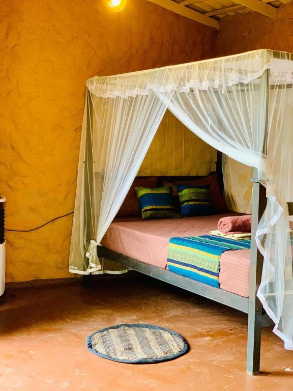 Postel nebo postele na pokoji v ubytování Ashok villa