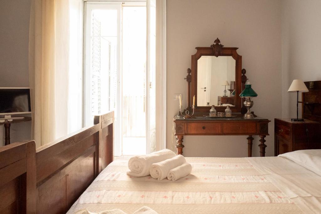 Postel nebo postele na pokoji v ubytování Casa Sipione Papa