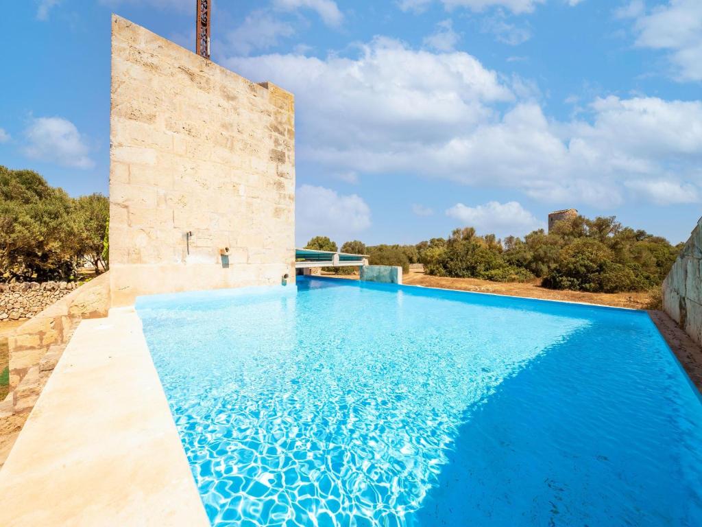 The swimming pool at or close to Possessio Sa Barrala Gallinero