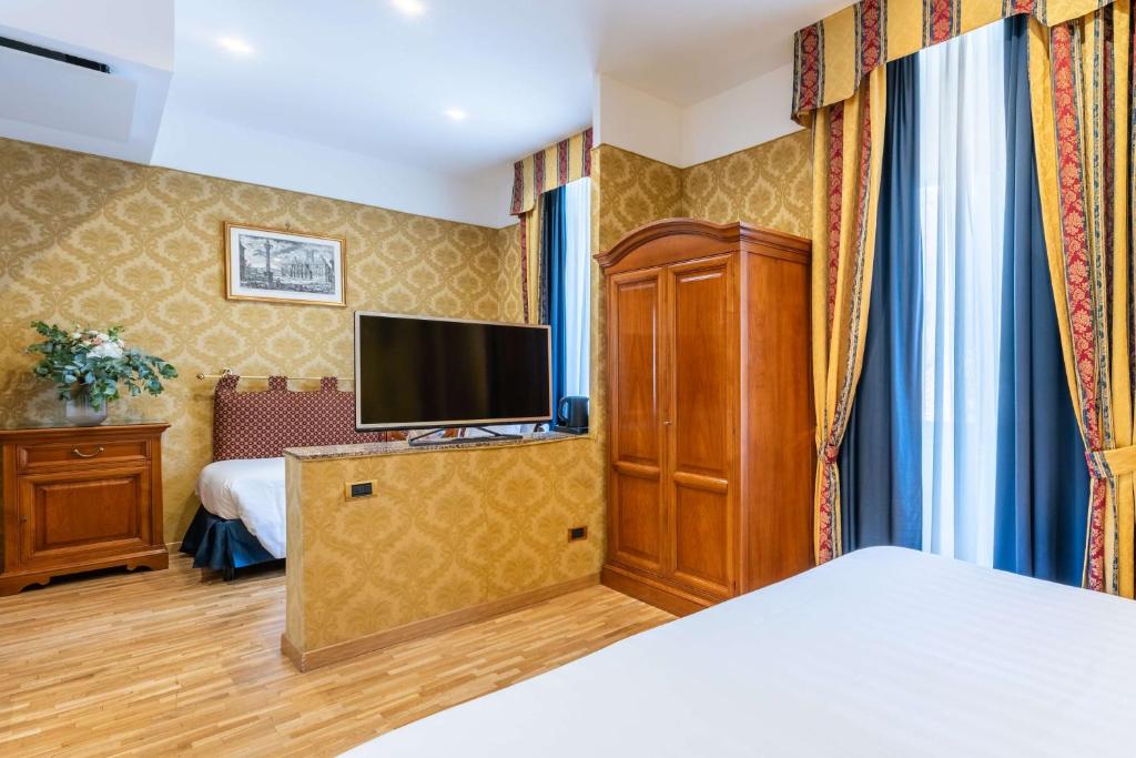 TV a/nebo společenská místnost v ubytování Hotel Raffaello - Sure Hotel Collection by Best Western