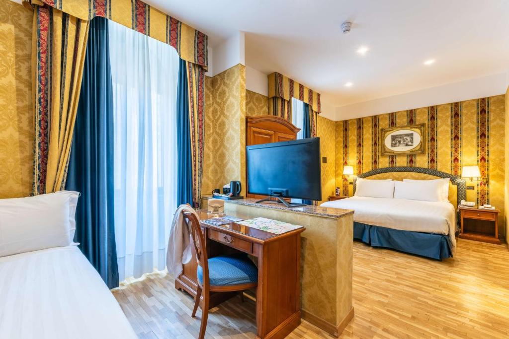 Postel nebo postele na pokoji v ubytování Hotel Raffaello - Sure Hotel Collection by Best Western
