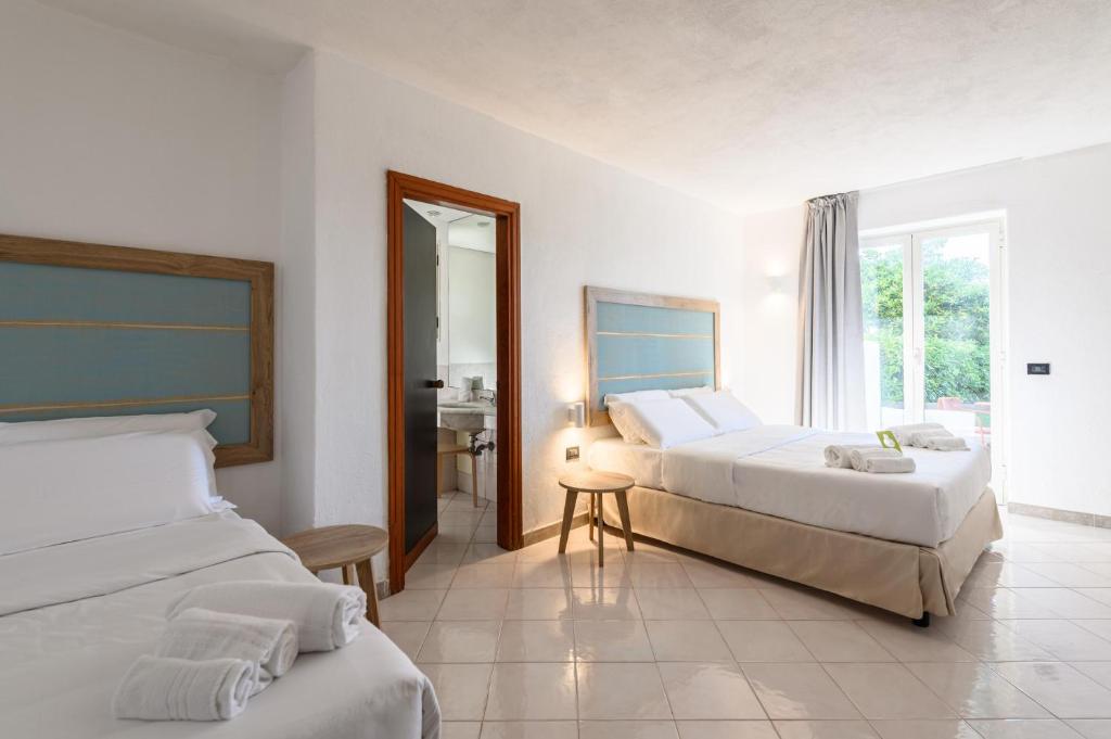 B&B HOTEL Ischia San Nicolaにあるベッド