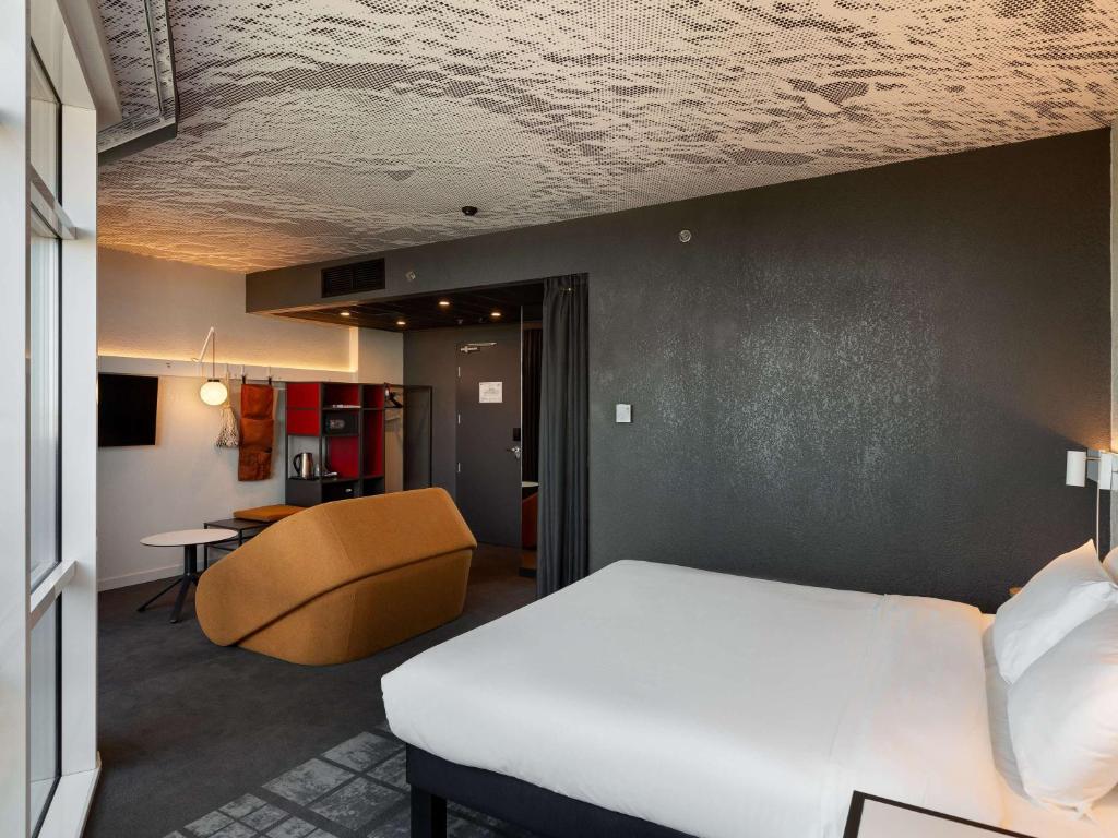 Postel nebo postele na pokoji v ubytování ibis Kyiv Beresteiska