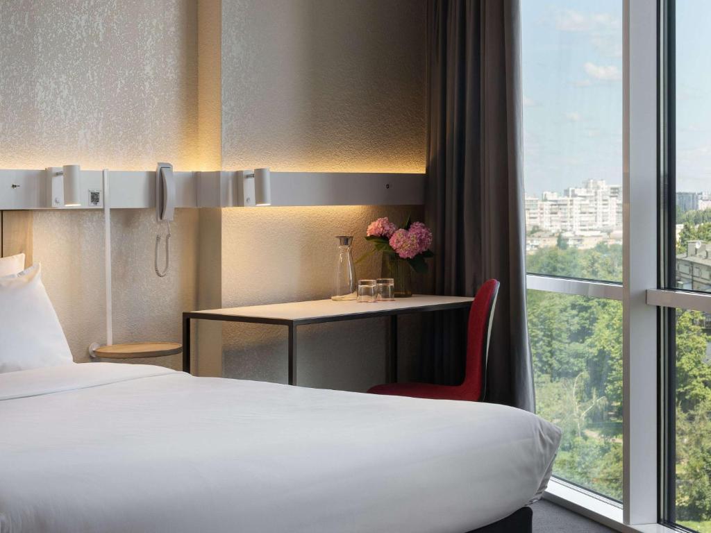 Postel nebo postele na pokoji v ubytování ibis Kyiv Beresteiska
