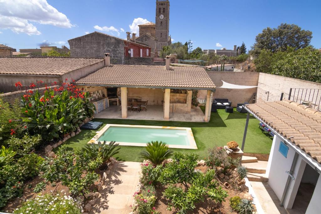 an aerial view of a house with a swimming pool at 271 Cas Padri Teco ETV6178 by Mallorca Charme in Ariany
