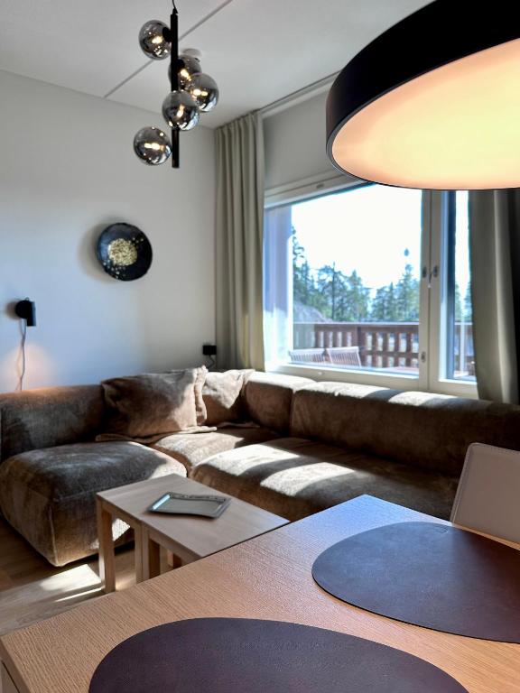 Гостиная зона в RUKA CHALET 2402 - High quality SKI apartment