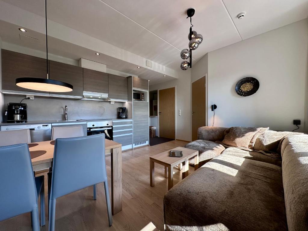 Кухня или мини-кухня в RUKA CHALET 2402 - High quality SKI apartment
