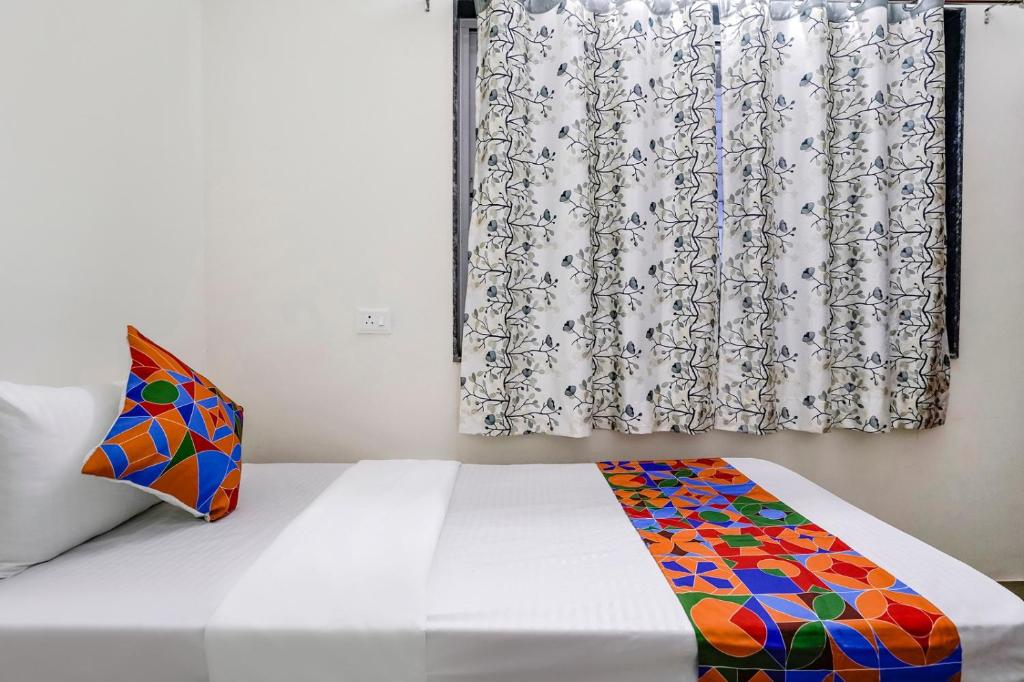 Postel nebo postele na pokoji v ubytování Hotel Comfort Caves