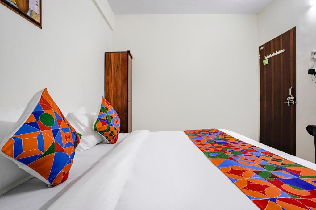 Postel nebo postele na pokoji v ubytování Hotel Comfort Caves