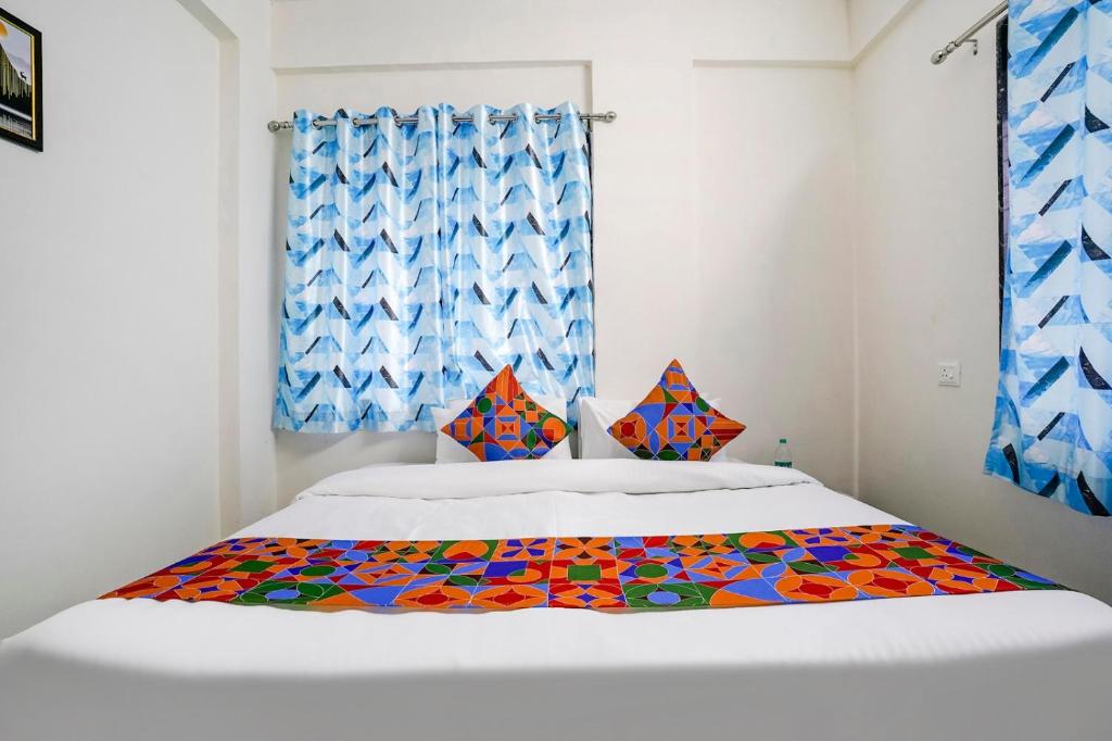 Postel nebo postele na pokoji v ubytování Hotel Comfort Caves