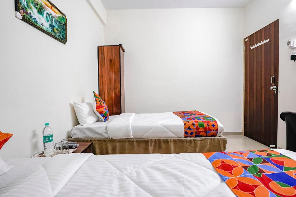 Postel nebo postele na pokoji v ubytování Hotel Comfort Caves
