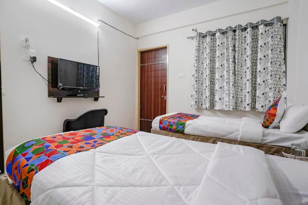 Postel nebo postele na pokoji v ubytování Hotel Comfort Caves