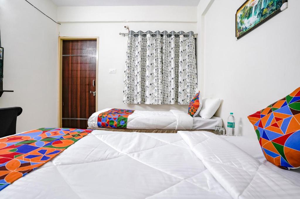 Postel nebo postele na pokoji v ubytování Hotel Comfort Caves