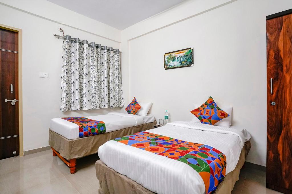 Postel nebo postele na pokoji v ubytování Hotel Comfort Caves