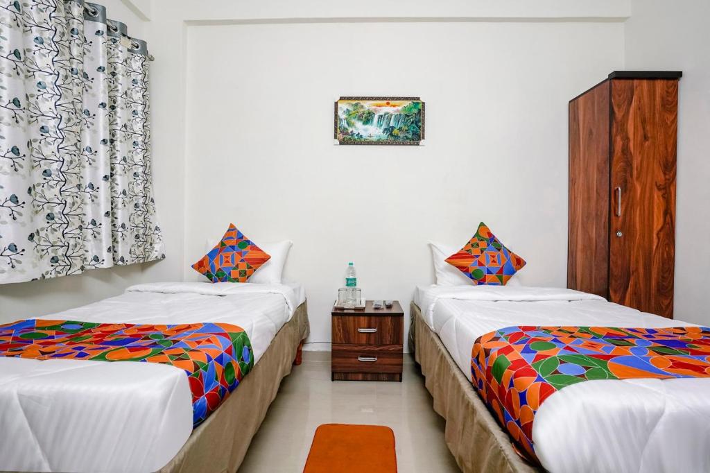 Postel nebo postele na pokoji v ubytování Hotel Comfort Caves