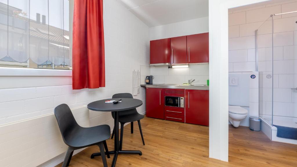Kuchyň nebo kuchyňský kout v ubytování Anstatthotel Cham - self-check-in