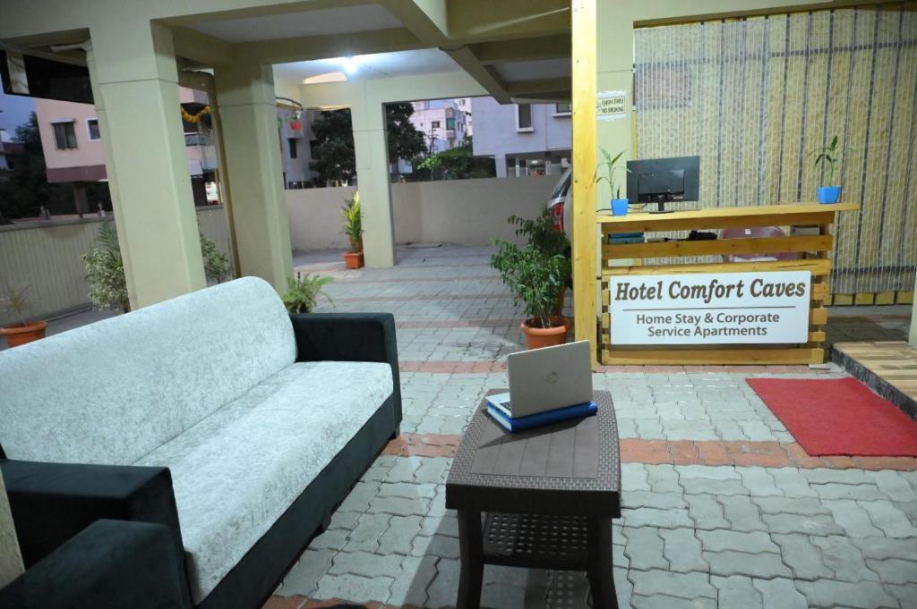 TV a/nebo společenská místnost v ubytování Hotel Comfort Caves
