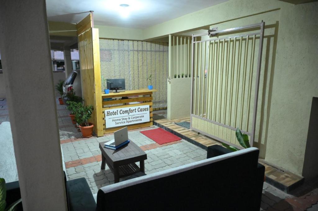 TV a/nebo společenská místnost v ubytování Hotel Comfort Caves