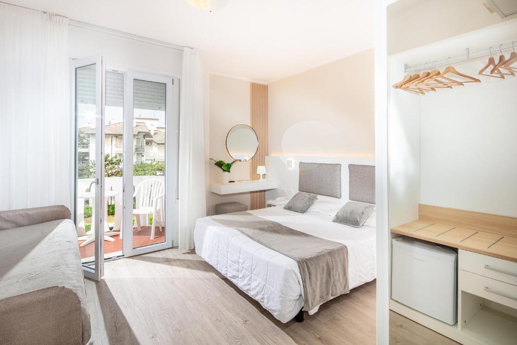 Łóżko lub łóżka w pokoju w obiekcie Hotel San Francisco