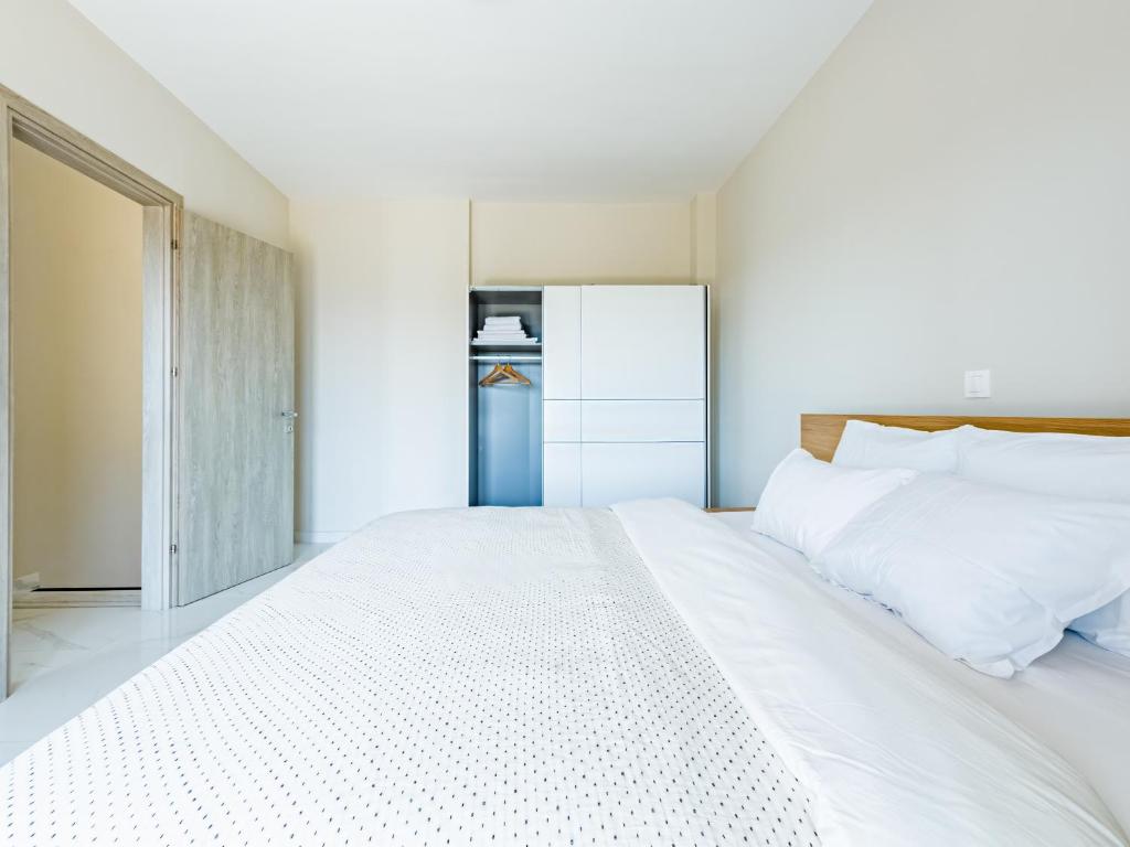 Posteľ alebo postele v izbe v ubytovaní Vacation house with a panoramic sea view and forest