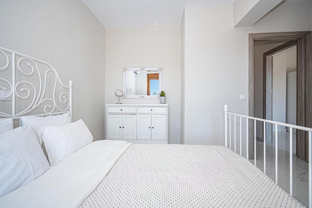 Posteľ alebo postele v izbe v ubytovaní Vacation house with a panoramic sea view and forest