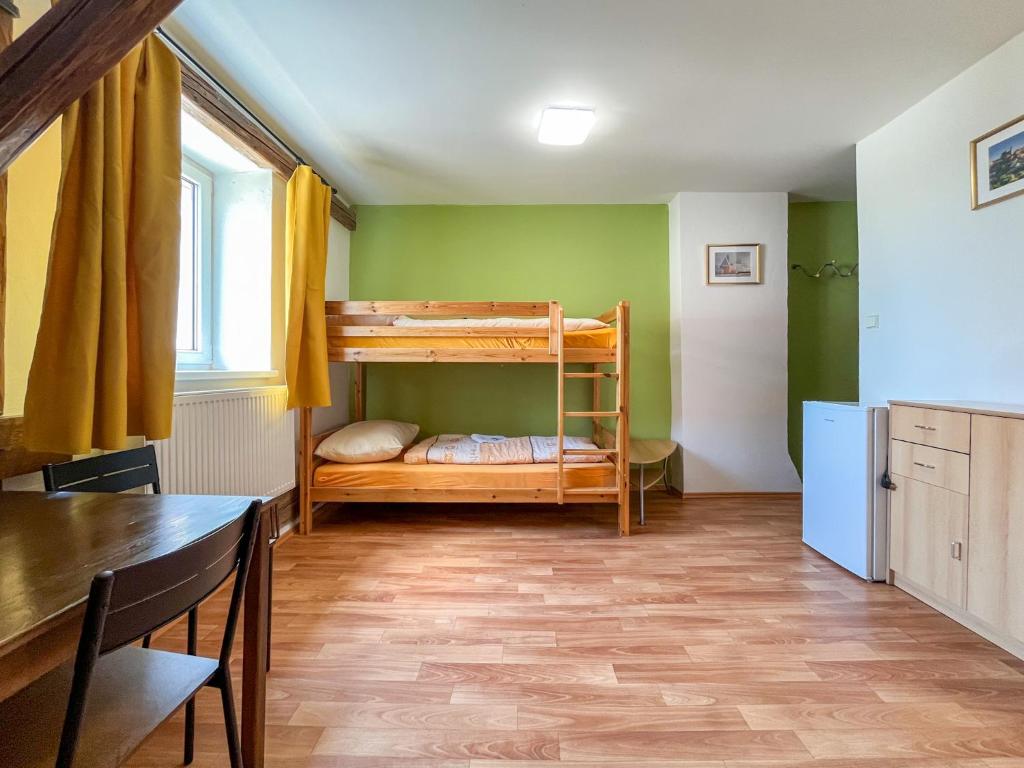 Postel nebo postele na pokoji v ubytování Penzion U Fandy