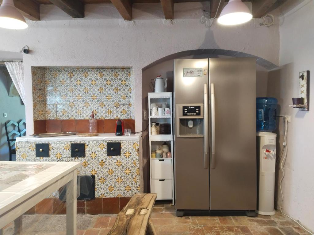 Kuchyň nebo kuchyňský kout v ubytování Can Camós - Masia Rural