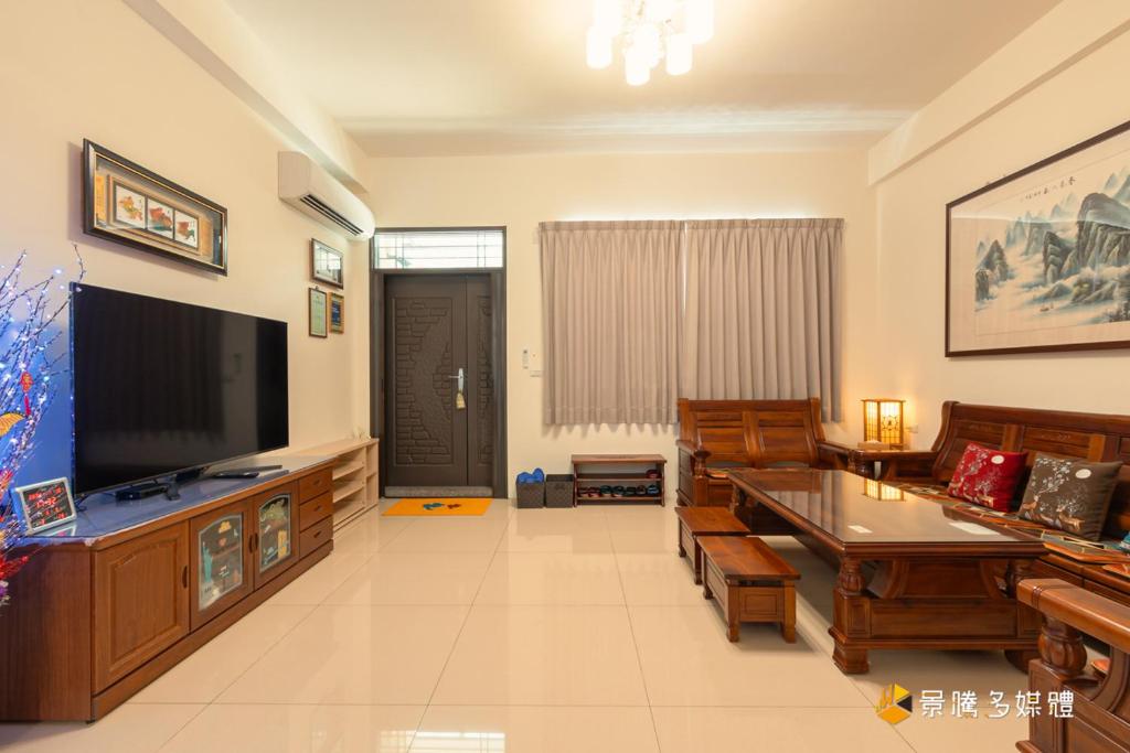 TV a/nebo společenská místnost v ubytování Hong Lai Guest House
