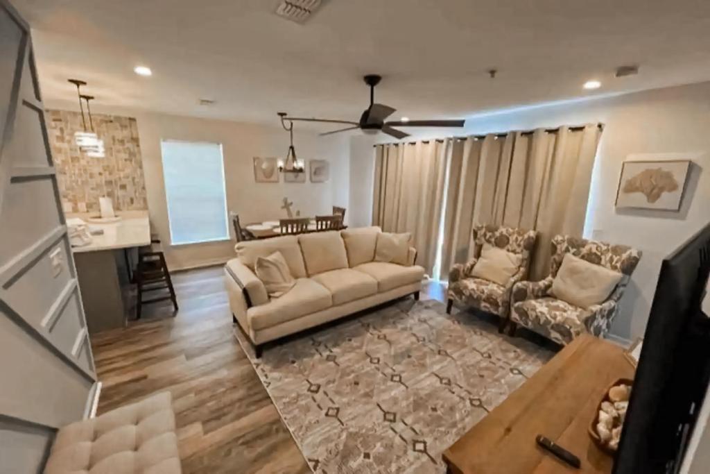 a living room with a couch and a table at Gulf Island Condo 431 in Navarre