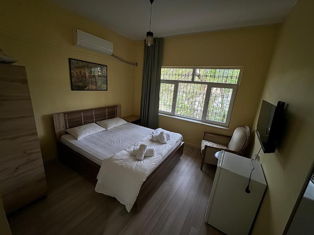 Postel nebo postele na pokoji v ubytování Avio Hotel