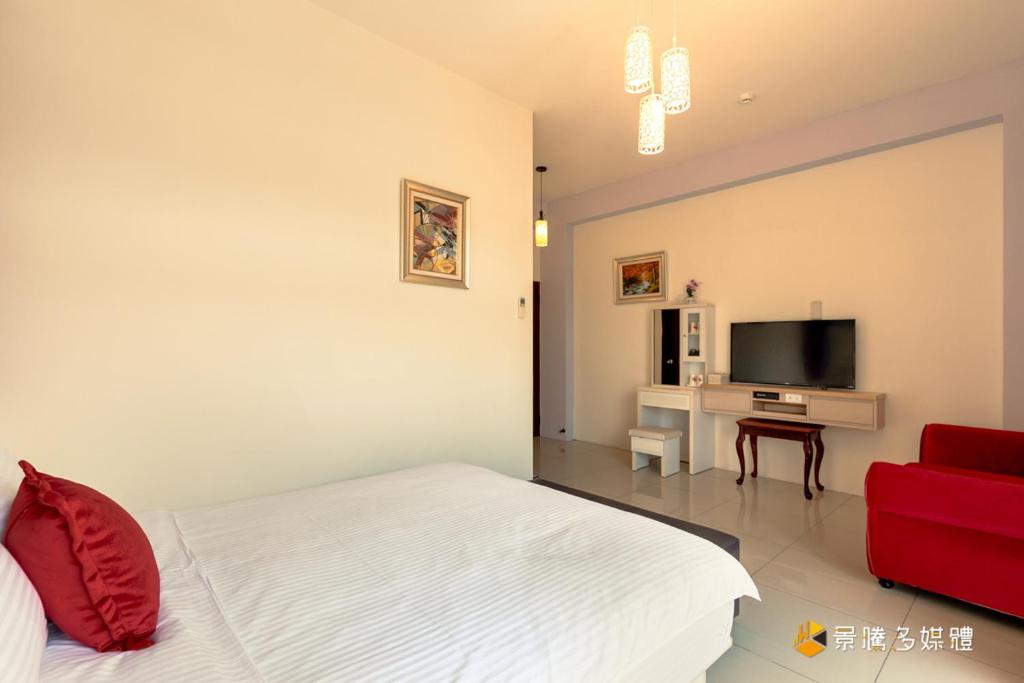 TV a/nebo společenská místnost v ubytování Hong Lai Guest House