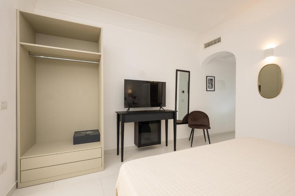 TV a/nebo společenská místnost v ubytování Casa Giuliani Capri