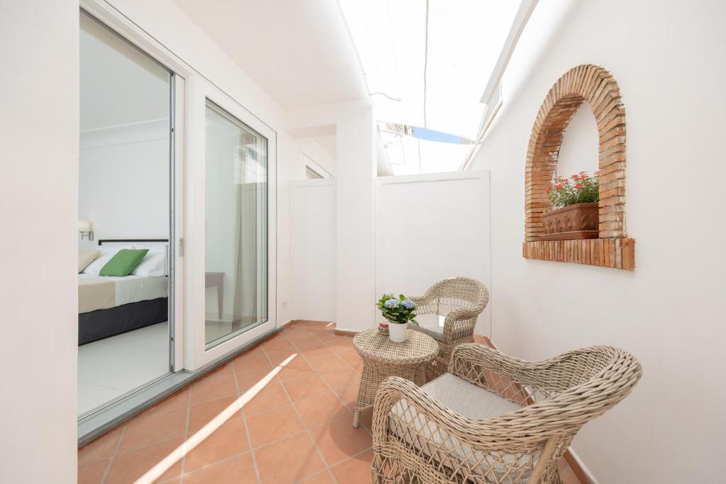 Posezení v ubytování Casa Giuliani Capri
