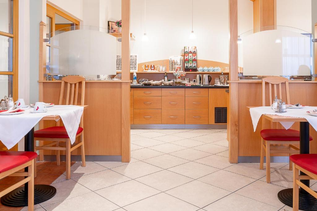 Kuchyň nebo kuchyňský kout v ubytování Hotel Feichtinger Graz