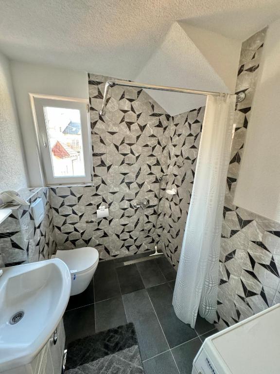 Koupelna v ubytování Room Ejna 2