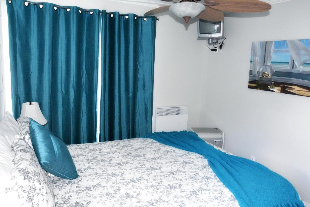 Postel nebo postele na pokoji v ubytování Condos Memphrémagog