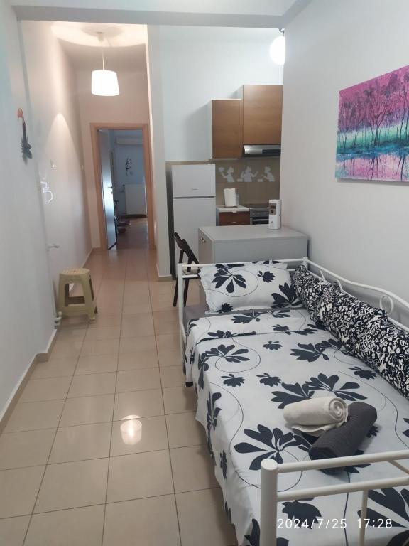 Posteľ alebo postele v izbe v ubytovaní Acropolis Urban Flat