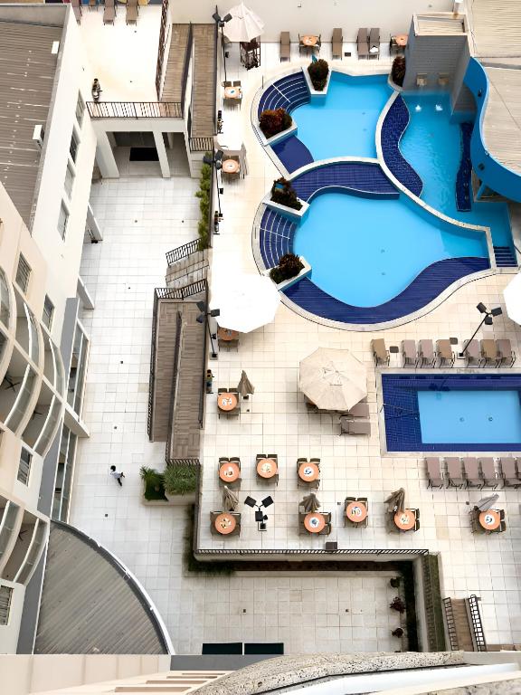 Bazén v ubytování Atrium Thermas Residence Service nebo v jeho okolí