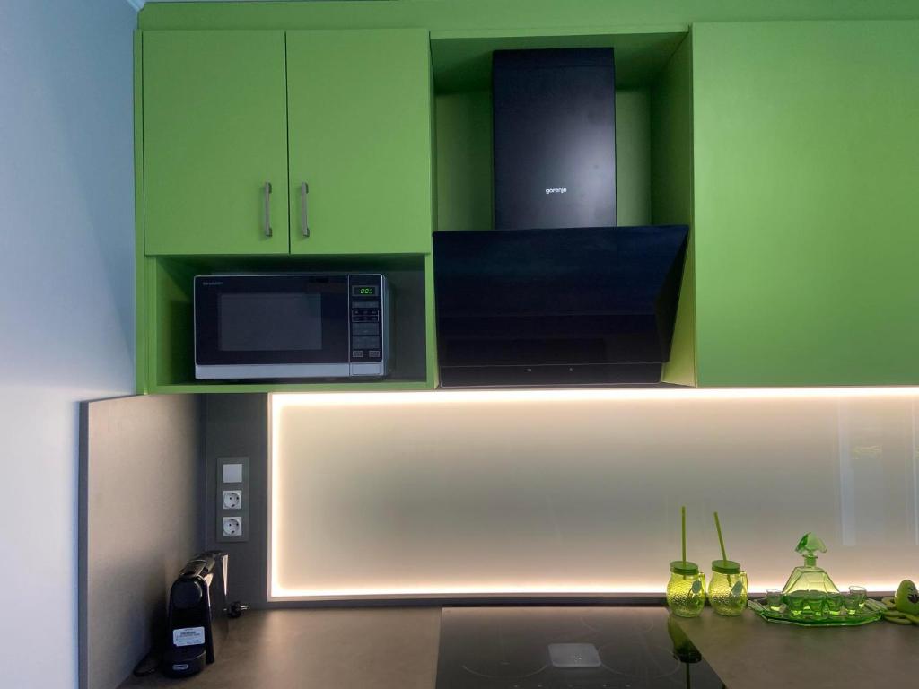 Kuchyňa alebo kuchynka v ubytovaní Karát apartmanok 2
