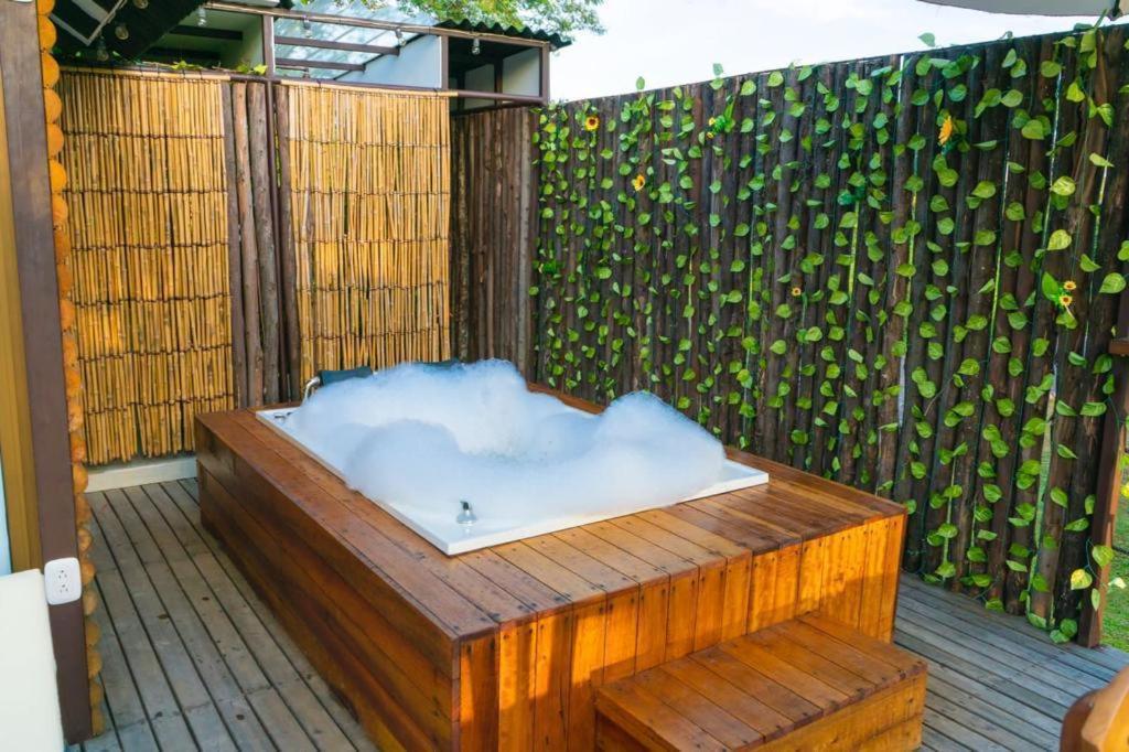 Postel nebo postele na pokoji v ubytování Glamping Villas del Llano