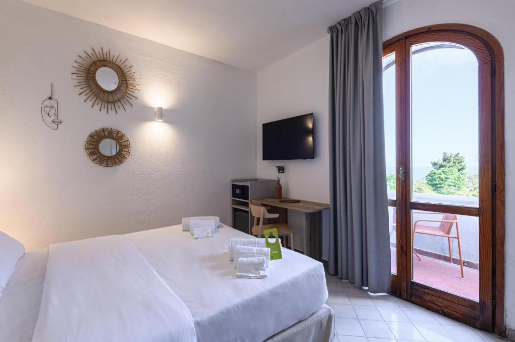 B&B HOTEL Ischia San Nicolaにあるベッド