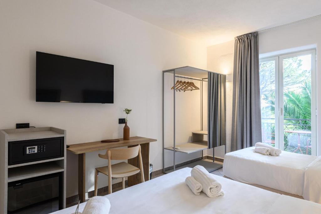 B&B HOTEL Ischia San Nicolaにあるベッド