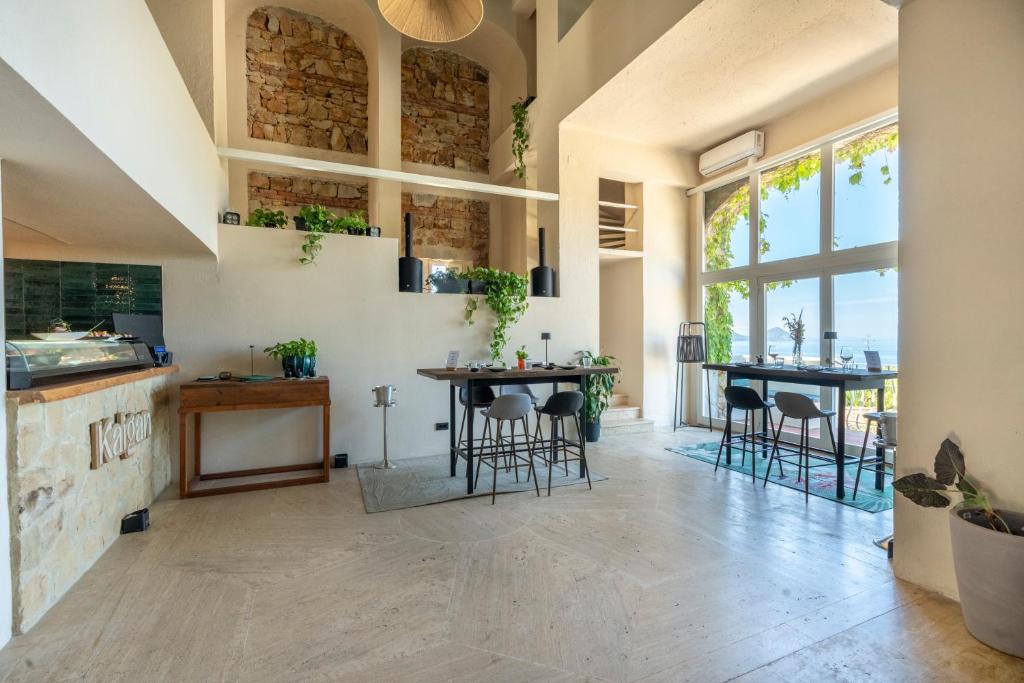 Kuchyň nebo kuchyňský kout v ubytování Mangia's Pollina Resort