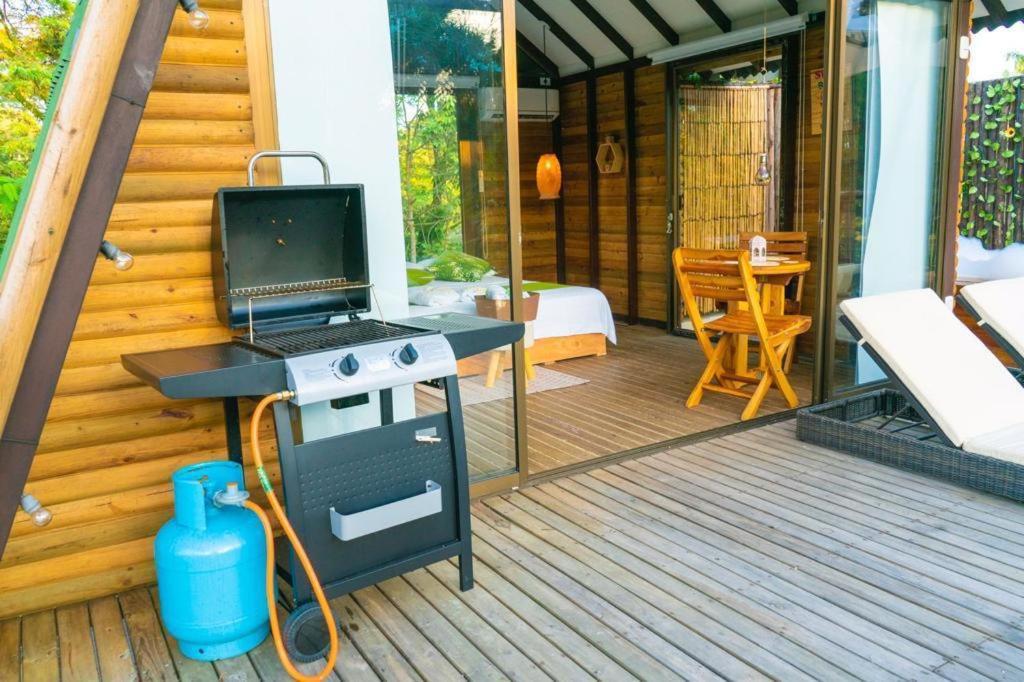 TV a/nebo společenská místnost v ubytování Glamping Villas del Llano