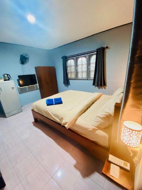 Postel nebo postele na pokoji v ubytování KANNIKA RESORT